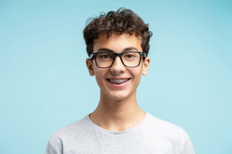 A smiling kid with braces